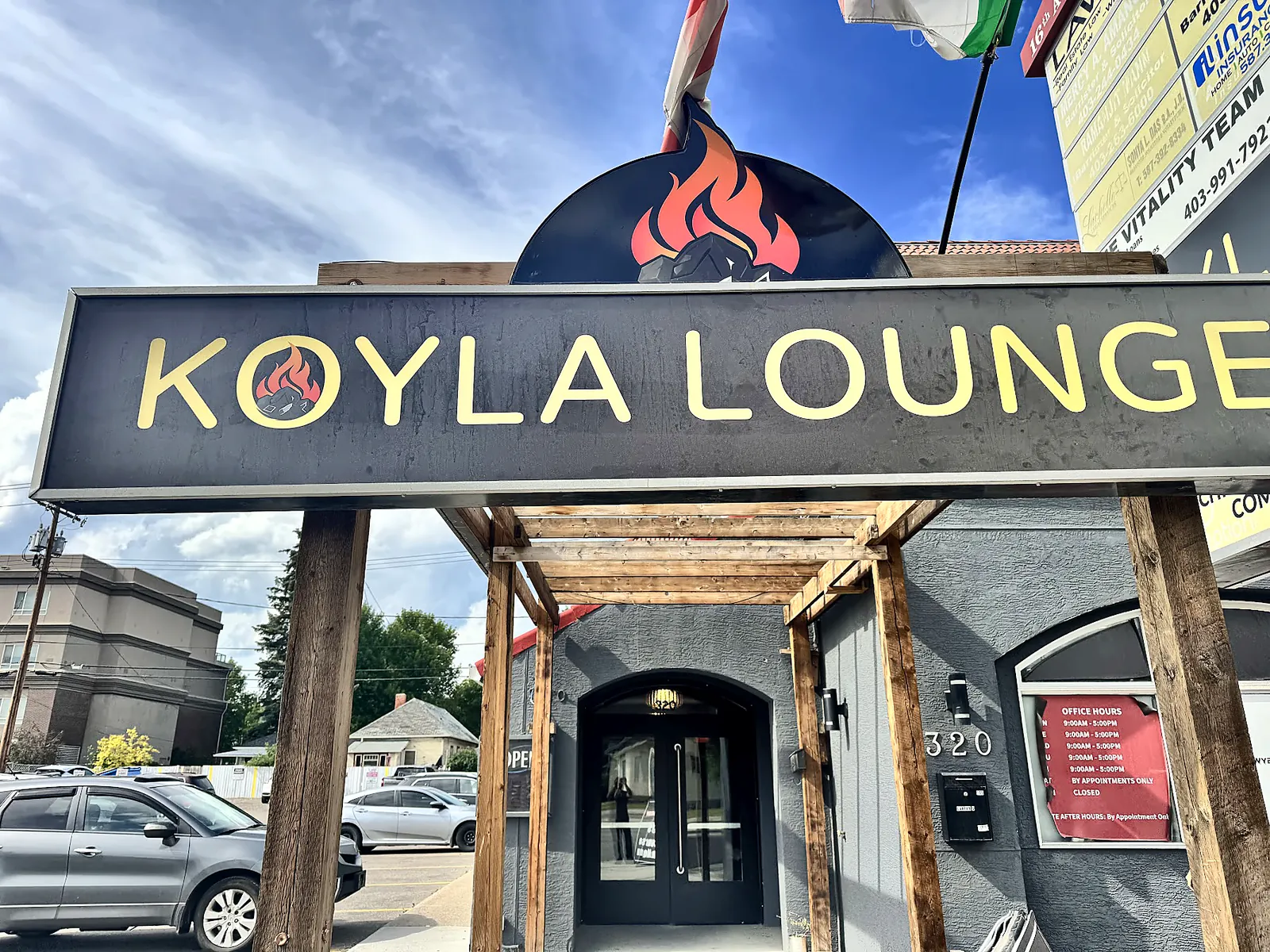 The KOYLA LOUNGE sign above the entrance on 16 Ave NW
