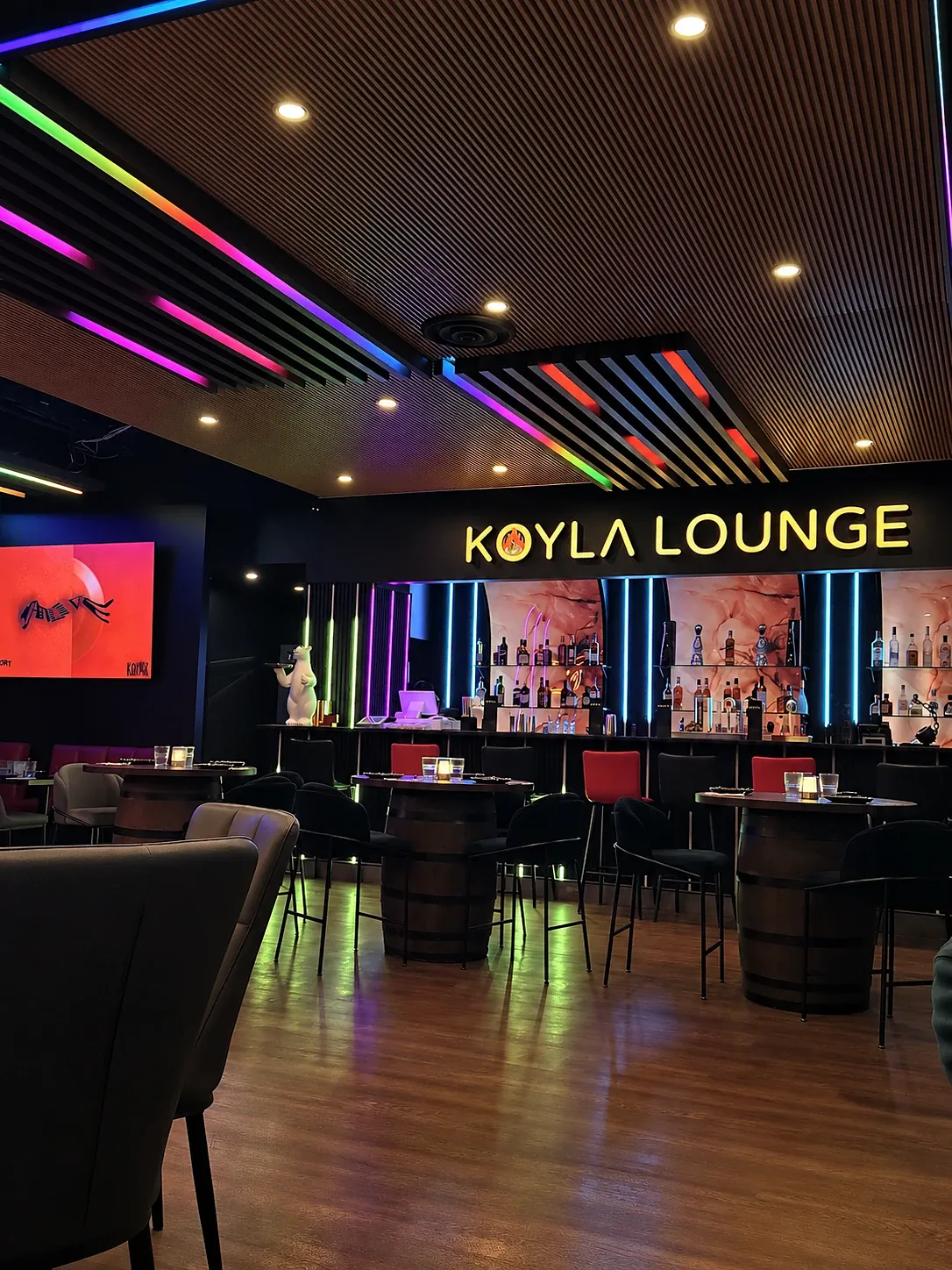 The Koyla lounge at night, set for an evening crowd